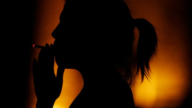 smoking cigarette 3.jpg